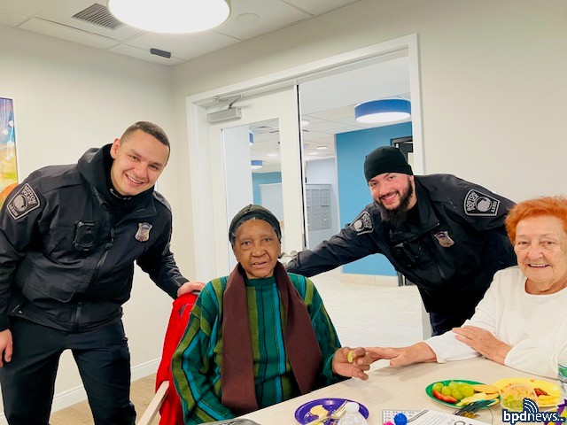 BPD Officers pose for a picture with senior community members