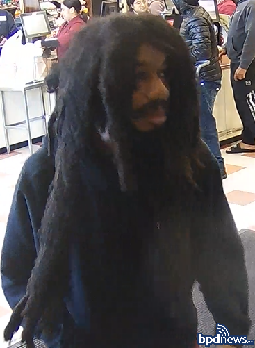 Surveillance image of credit card fraud suspect